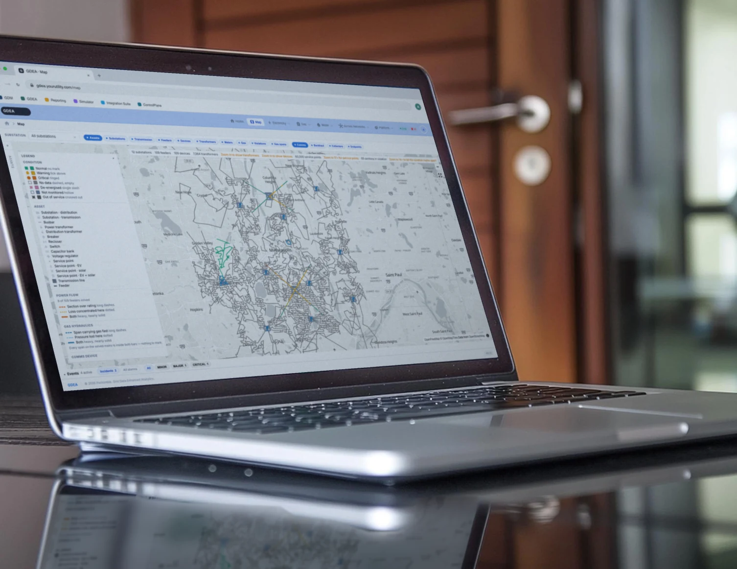 Grid Data Enhanced Analytics network map open on a laptop